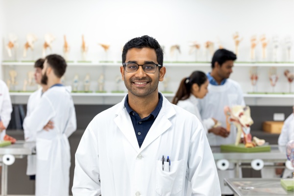 A group of students participates in a laboratory class